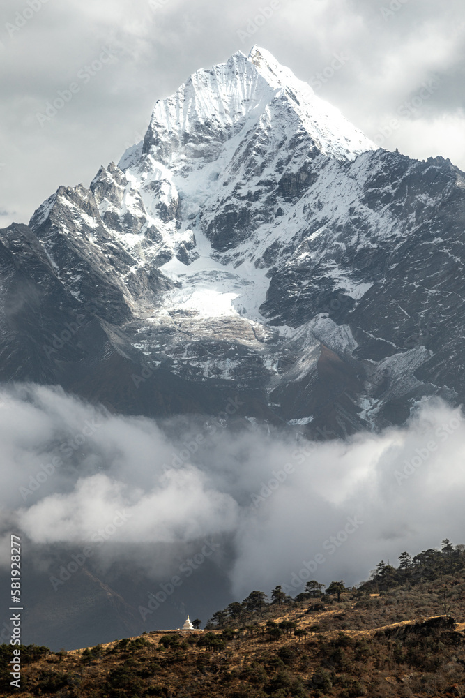 Impressive wall of Thamserku (6608m) seen during acclimatization hike above Khumjung Impressive wall of Thamserku (6608m) seen during acclimatization hike above Khumjung