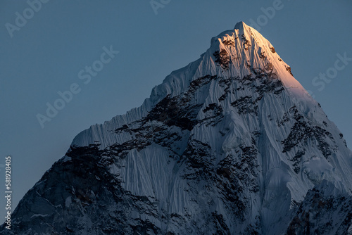 Ama Dablam (6812m): Tip of Ama Dablam being gently touched by last rays of the light. See ya tomorrow...
Photo taken from the village of Dzonghla photo