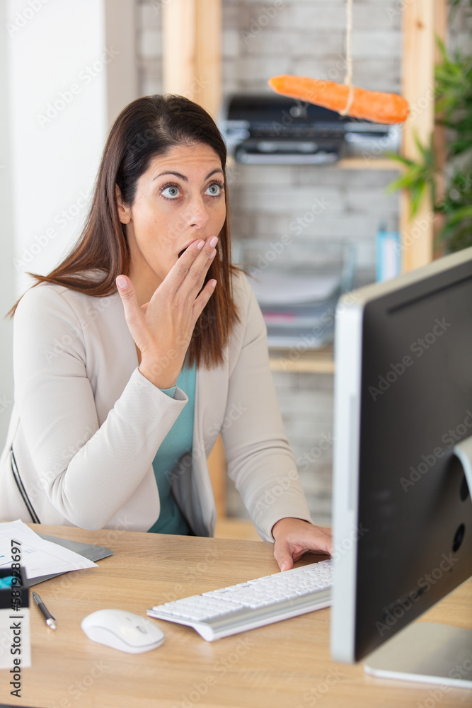 shocked surprised businesswoman amazed by reading unbelievable online news shocked surprised businesswoman amazed by reading unbelievable online news