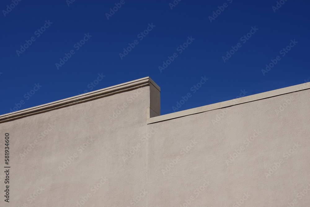 Warehouse building roof edge and blue sky Warehouse building roof edge and blue sky