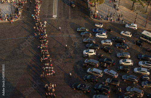 Photography Paris people block traffic on des Champs-Elysees