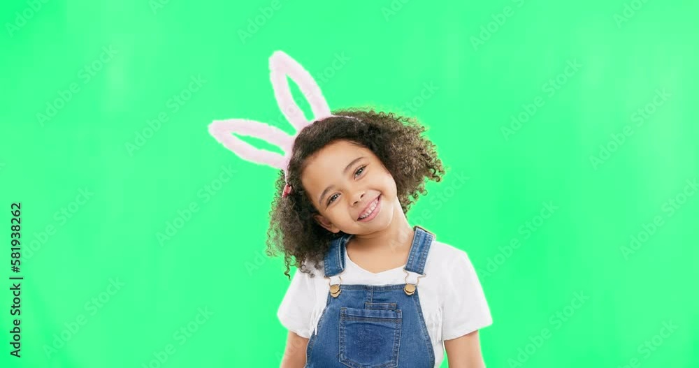 Cute, happy and face of a child with bunny ears isolated on a green screen studio background. Easter, smile and portrait of an adorable little girl smiling, looking cheerful and playful with mockup Cute, happy and face of a child with bunny ears isolated on a green screen studio background. Easter, smile and portrait of an adorable little girl smiling, looking cheerful and playful with mockup