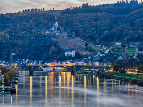 Long exposure shot of Cochem town and castle at dusk during autumn season in Cochem-Zell district, Germany