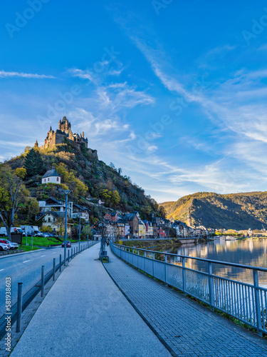 Street shot of Cochem town and castle in the afternoon during colourful autumn season in Cochem-Zell district, Germany