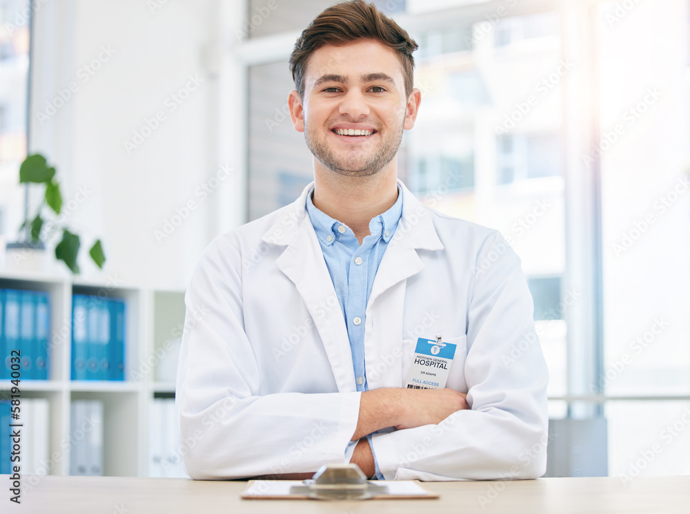 Medical, smile and portrait of happy doctor in a hospital office feeling happy, excited and proud in a clinic. Young, medicine and man healthcare professional arms crossed satisfied with health Medical, smile and portrait of happy doctor in a hospital office feeling happy, excited and proud in a clinic. Young, medicine and man healthcare professional arms crossed satisfied with health