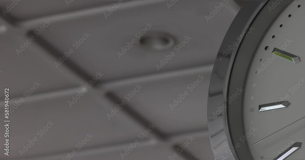 The second hand on the clock is moving continuously. The frame shows a