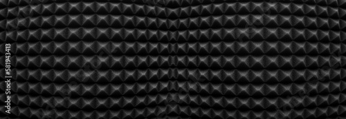 Abstract black - white background with uneven surface, long format banner. Corrugated surface with a visual effect.