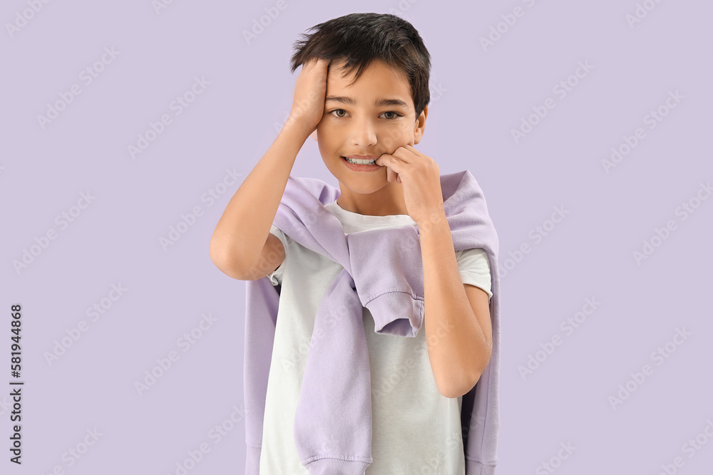 Little boy biting nails on lilac background - obrazy, fototapety, plakaty 