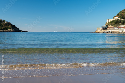 White sandy La Concha beach in central part of Donostia or San Sebastian city, Basque Country, Spain