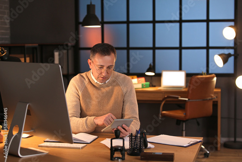 Focused businessman working...