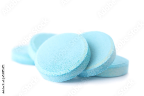Blue soluble tablets isolated on white background