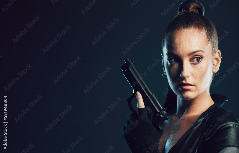 Woman, vigilante and gun in serious war, battle or agent standing ready for mission on mockup. Female spy holding weapon for secret operation, objective or cosplay against a dark studio background Woman, vigilante and gun in serious war, battle or agent standing ready for mission on mockup. Female spy holding weapon for secret operation, objective or cosplay against a dark studio background