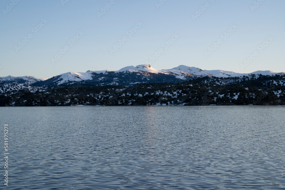 Panorama view of the Andes mountains and Aluminé lake, at sunrise, in Villa Pehuenia, Patagonia Argentina.