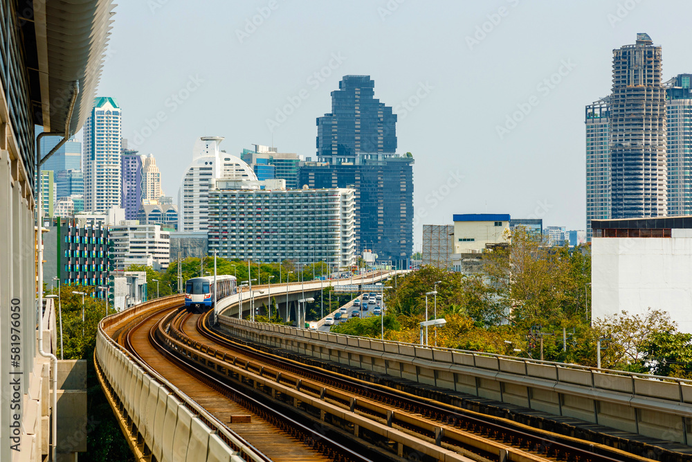 Fototapeta premium BTS Sky Train is running in downtown of Bangkok. Sky train is fastest transport mode in Bangkok