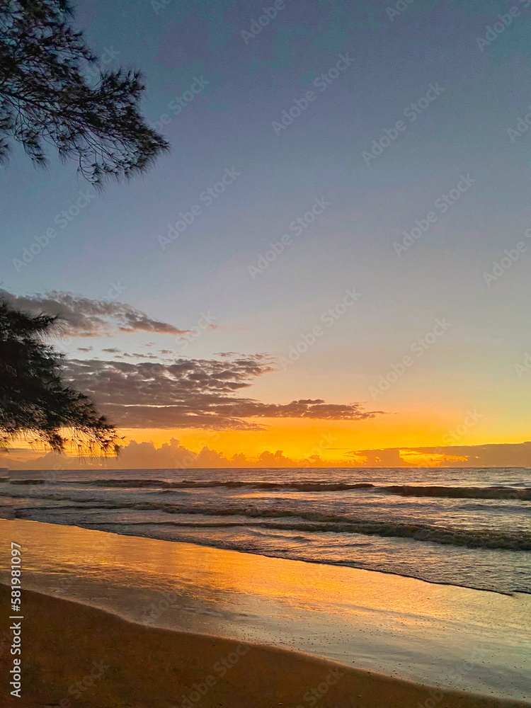 Beautiful sunrise by the sea, with an orange sky Beautiful sunrise by the sea, with an orange sky