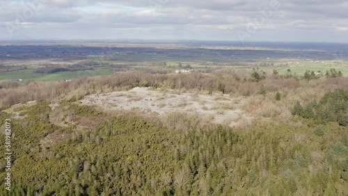 Aerial Orbit of Knockma Forest Hilltop, Cnoc Meadha, Ireland photo