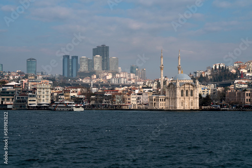 Ortakoy Mosque (Buyuk Medjidie Kamii) in Besiktas district on the embankment of the Ortakoy Pier Square from the waters of the Bosphorus, Istanbul, Turkey