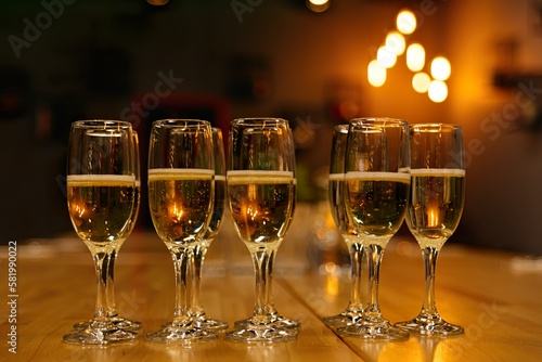 Glasses of champagne on a table, close-up. Welcome drinks on a party. Depth of filed.