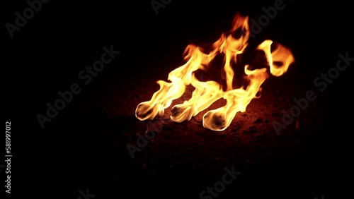 Props, inventory for the fire show. Evening show program on the street. Hot poi. Slow motion.