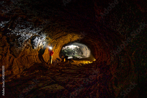 A lava tunnel in Dinh Quan, Dong Nai province, Vietnam. This is a beautiful lava tunnel hidden by the cave photo