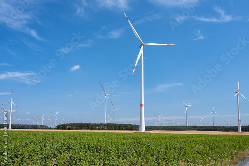 Modern wind energy turbines with a blue sky in Germany