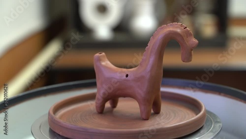 Ceramics, a ceramic product made with their own hands on a potter's wheel, a mug.