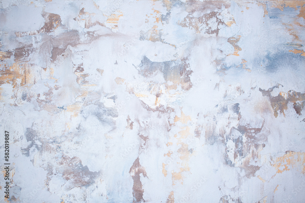 Obraz premium Gray background of decorative plaster with abstract spots. Unusual silver wall texture with beautiful patterns, creative surface background. Dressing coating for building cladding.