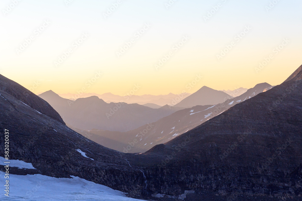 Mountain snow panorama with col Fuscherkarscharte during sunrise in Glockner Group, Austria