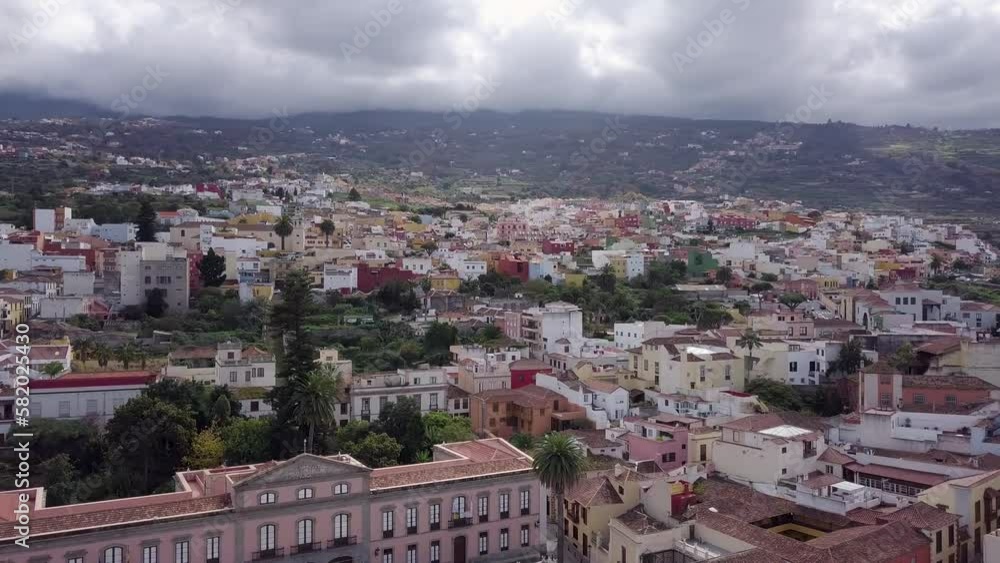 aerial panoramic of puerto De la Cruz tenerife island canary spain drone reveal cityscape with mountains in background aerial panoramic of puerto De la Cruz tenerife island canary spain drone reveal cityscape with mountains in background