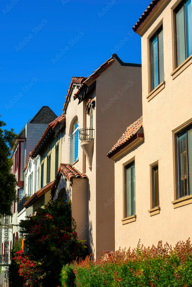 Row of decorative american dream style san francisco california historic district houses in middle class suburb
