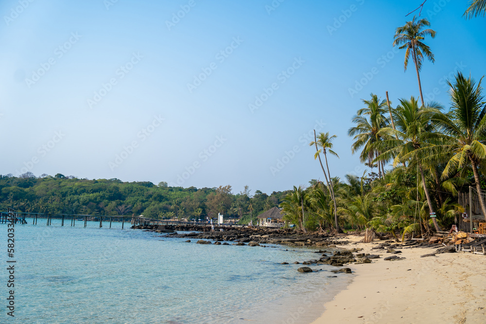 Panoramic view of the beach at Koh Kood in Thailand on a sunny day.