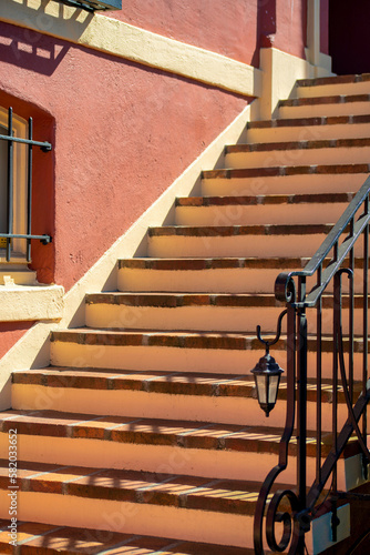 Stone or tile cement steps on building or house and home in downtown neighborhood in north american city