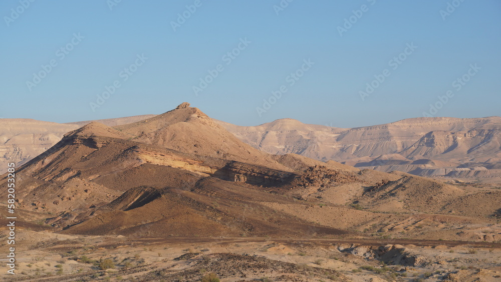 Sunrise view of HaMakhtesh HaGadol the big crater, in the Negev Desert, Southern Israel. It is a geological landform of a large erosion cirque