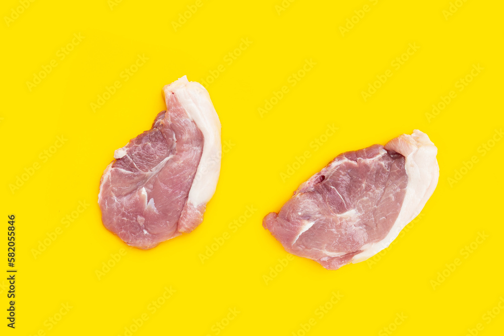 Pork meat on yellow background. Pork meat on yellow background.