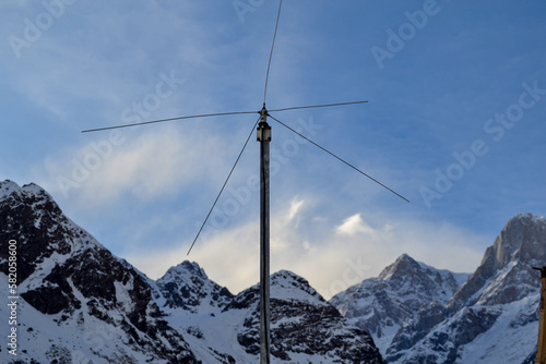An Antenna in Mountain Himalaya India. In radio engineering, an antenna or aerial is the interface between radio waves propagating through space.