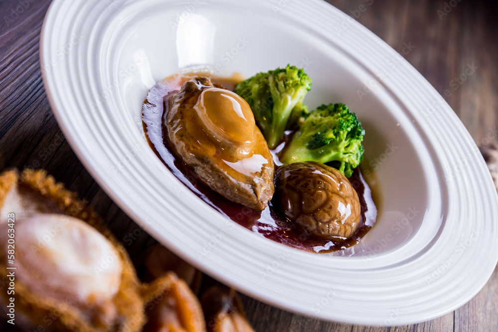 expensive premium braised head abalone with sea cucumber and flower