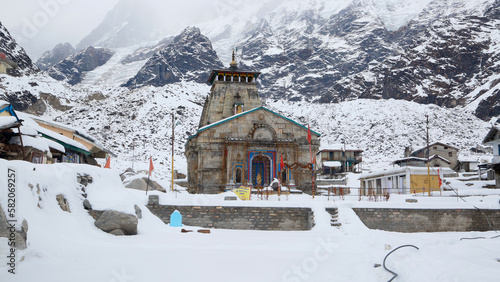 Kedarnath temple during winter and snow fall in Uttarakhand. Kedarnath temple is a Hindu temple dedicated to Shiva. Located on the Garhwal Himalayan range near the Mandakini river,  photo