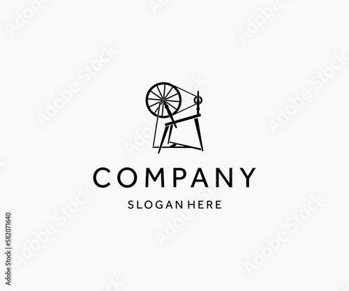 Luxury traditional spinning wheel logo design vector