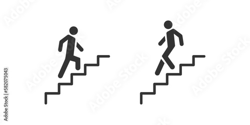 Up and down staircase vector icon. Staircase vector symbol is isolated on a grey background photo