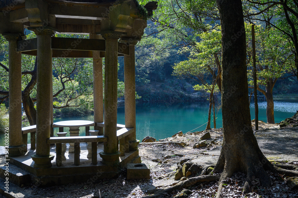 A romantic and dreamy paradise. The pavilion, the turquoise lake and the trees. Spring is the best time for walking trails and lake tours. Xinshan Dream Lake, Taiwan A romantic and dreamy paradise. The pavilion, the turquoise lake and the trees. Spring is the best time for walking trails and lake tours. Xinshan Dream Lake, Taiwan