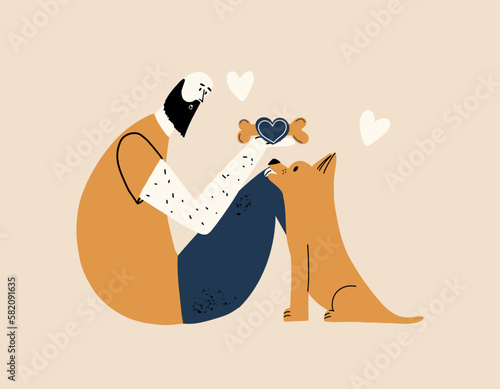 The dog and his owner spend time together. Animal care concept.