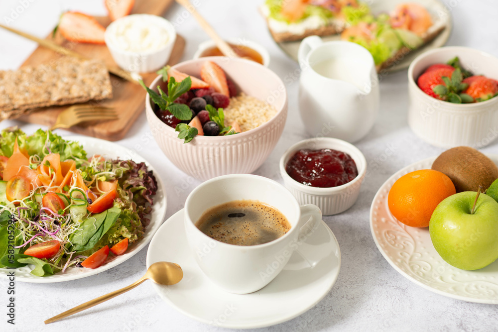 Healthy breakfast set on grey background. The concept of delicious and healthy food.