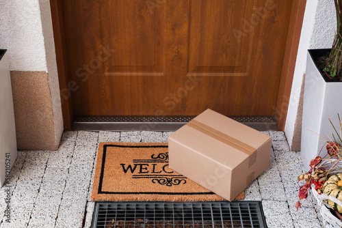 Parcel delivered on mat near front door