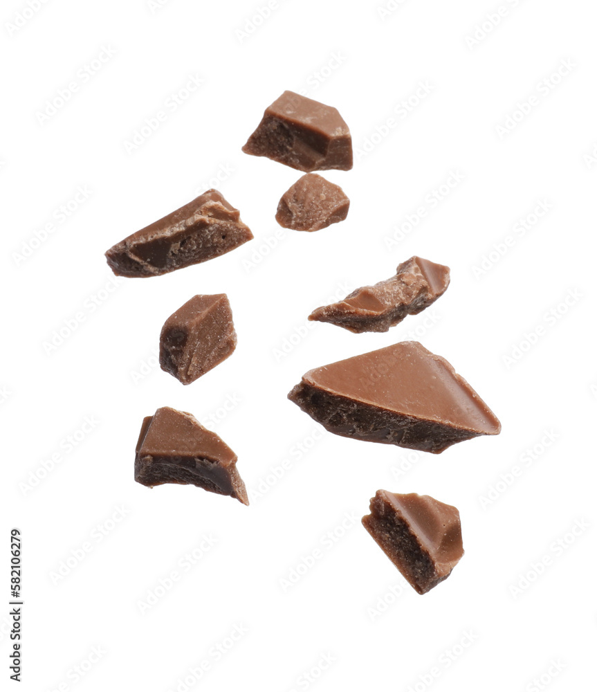 Pieces of tasty chocolate bar isolated on white Pieces of tasty chocolate bar isolated on white