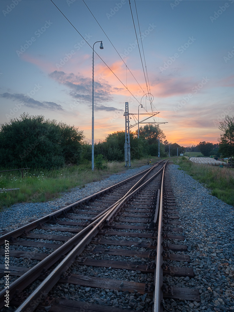 nice sky with sunset over railway track