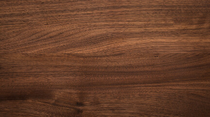 Walnut wood texture background. Wide format black walnut natural texture desktop background.