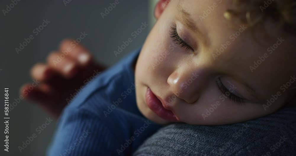 Close Up on a Sleeping Toddler Resting his Head on his Mother's Shoulder. Little Male Baby Feeling Safe and Loved, Dreaming Happy Dreams. Cute Blond Boy Tired After Playing, Taking a Nap Close Up on a Sleeping Toddler Resting his Head on his Mother's Shoulder. Little Male Baby Feeling Safe and Loved, Dreaming Happy Dreams. Cute Blond Boy Tired After Playing, Taking a Nap