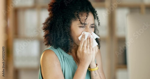 Business woman, tissue and nose at night for allergies, problems and cold virus at office computer. Sick female employee, flu and sneeze from allergy risk, health crisis and medical sinusitis illness photo