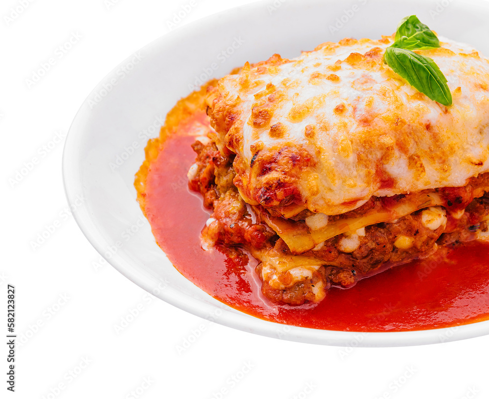 italian lasagna with tomato sauce isolated on white background italian lasagna with tomato sauce isolated on white background