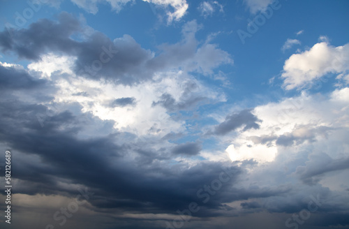 Fototapeta Naklejka Na Ścianę i Meble -  Thunderclouds in the sky at sunset.